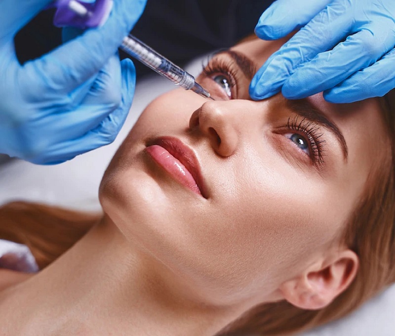 young-pretty-woman-is-preventing-age-by-visiting-cosmetologist-getting-botox-injections-into-face_317809-5675